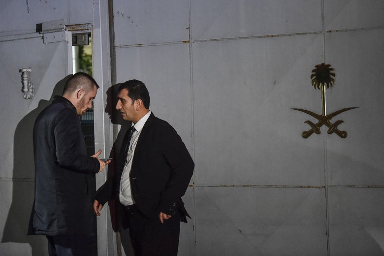 Security members of the consulate wait in front of the gate of the Saudi Arabian consulate on October 17, 2018 in Istanbul.